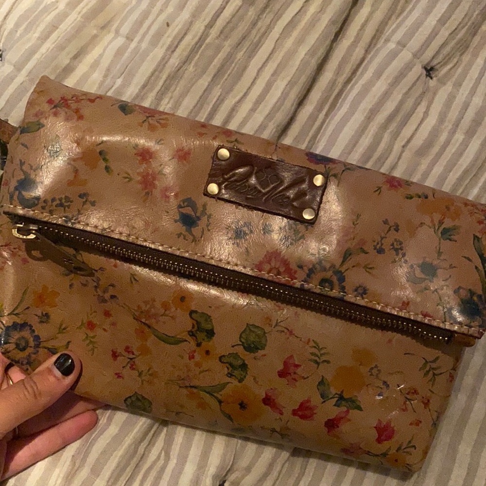Brown leather floral Patricia Nash clutch